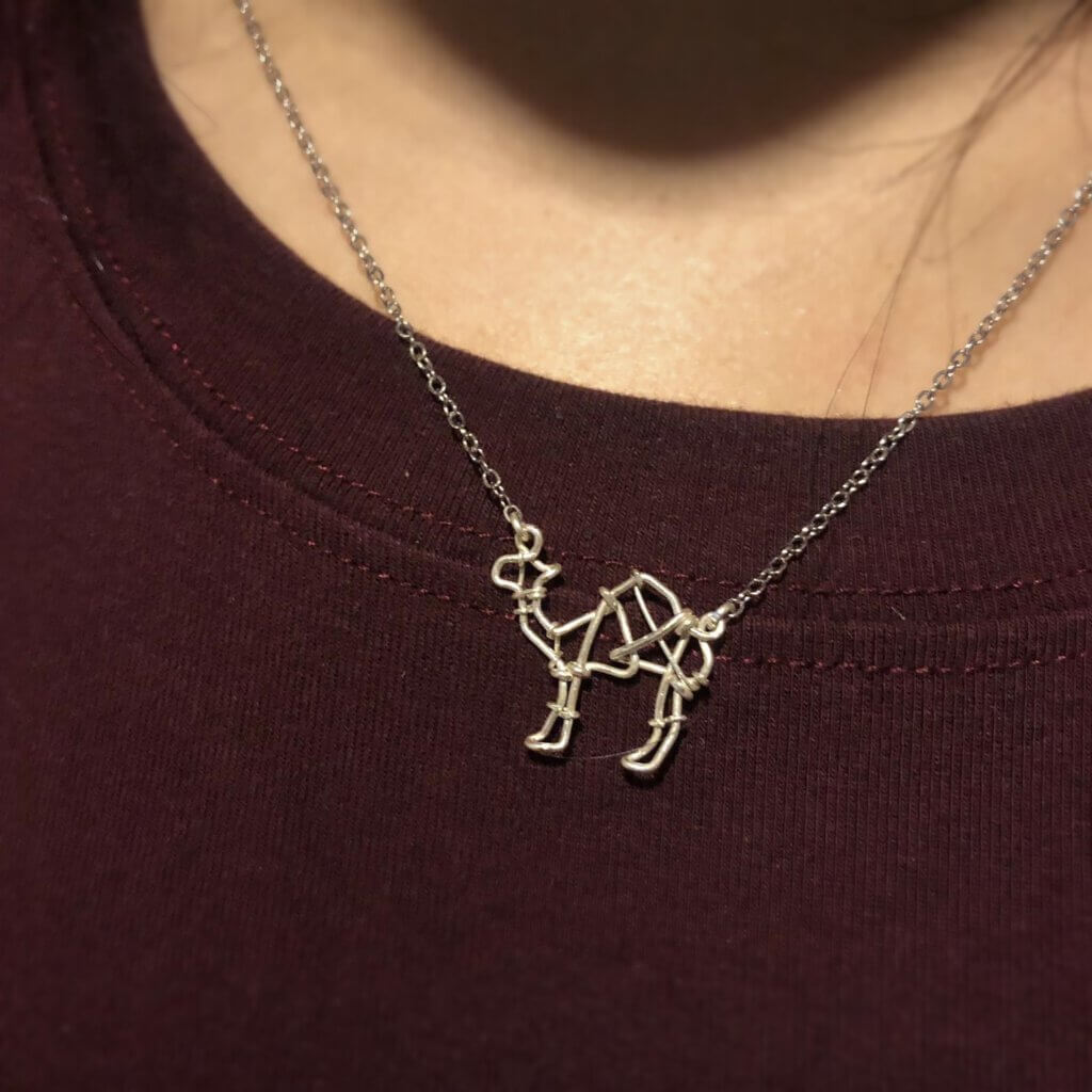 Necklace with camel silhouette. Pendant in 925 silver.