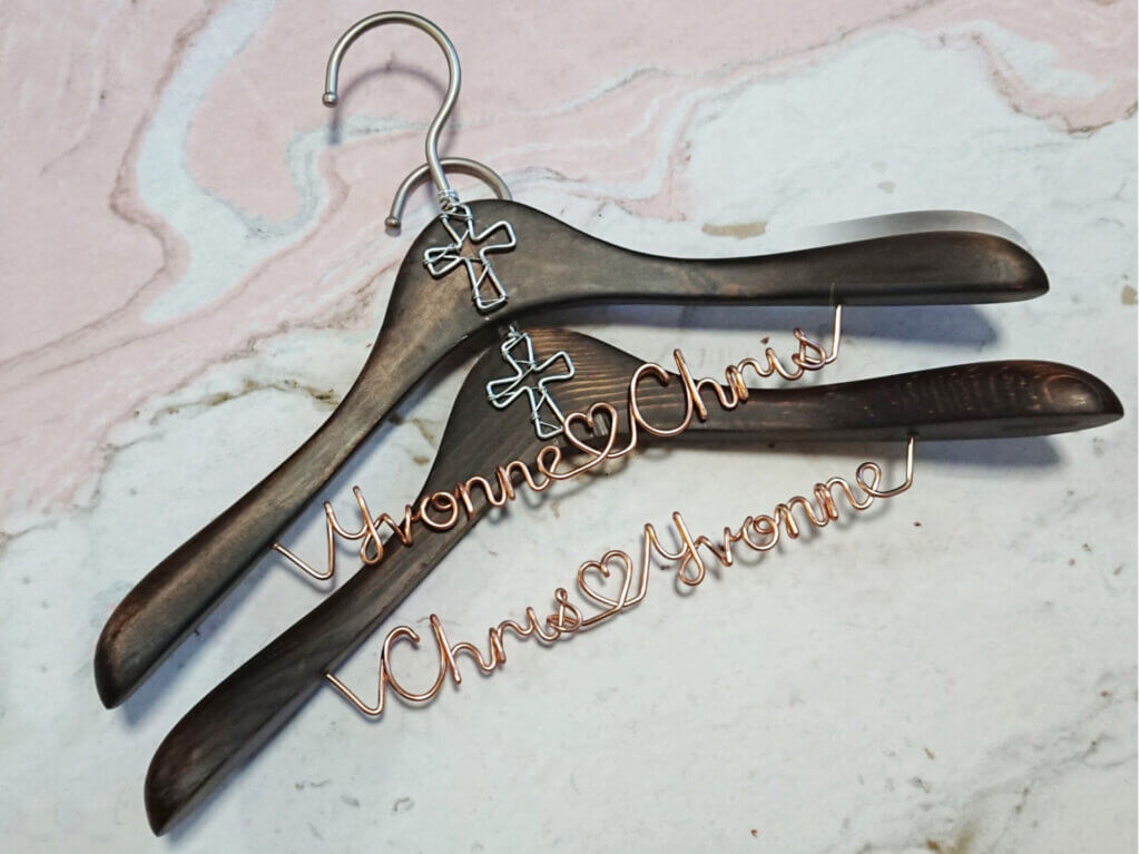 Wedding hanger with couple names. With cross charm